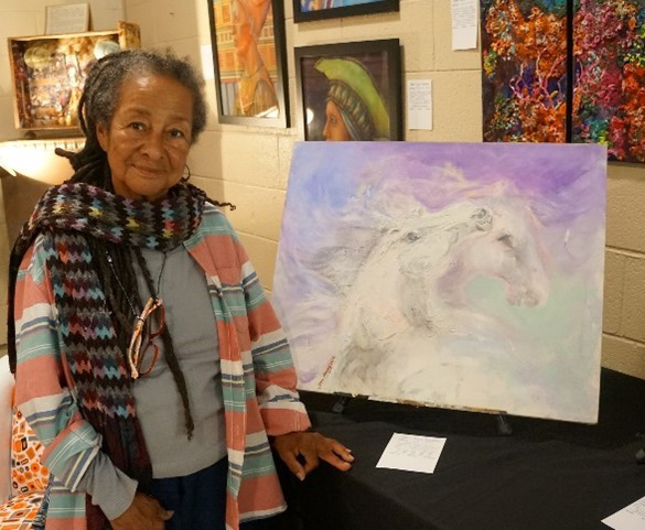 Jean Muson with her artwork.