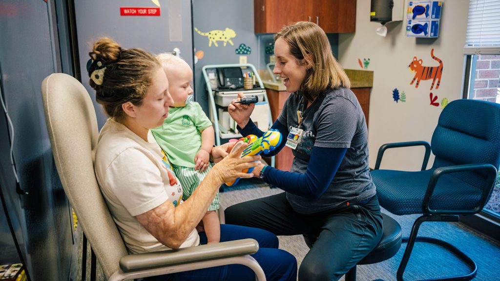 Audiologist Dr. Sarah Stalnaker with patient